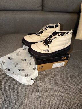 The North Face Insulated Slip-On Mules in Cream and Black